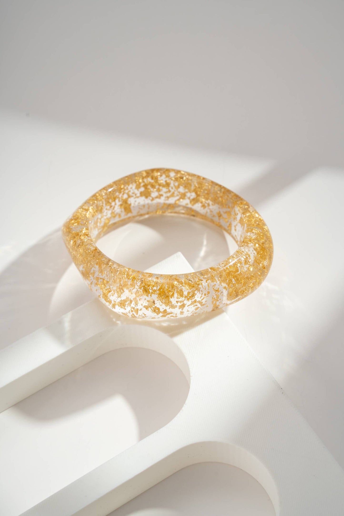 Armband aus transparentem Harz vergoldeter Edelstahl