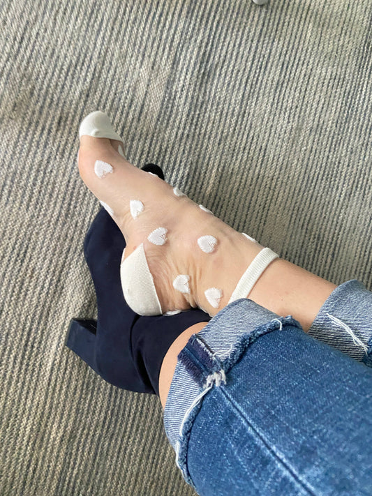 Laure transparente Socken mit weißen Herzen