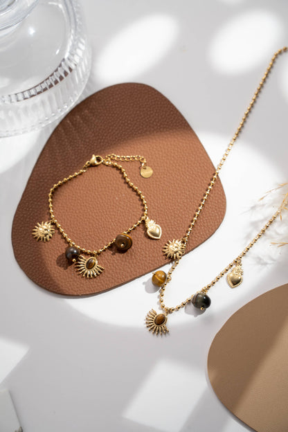 Goldenes Collier, sonnig, Bernstein‑Tigerauge, warmer Glanz, leuchtendes Herz