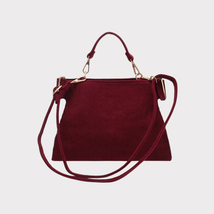 Schultertasche mit Griff, Reißverschluss und gerippter Optik