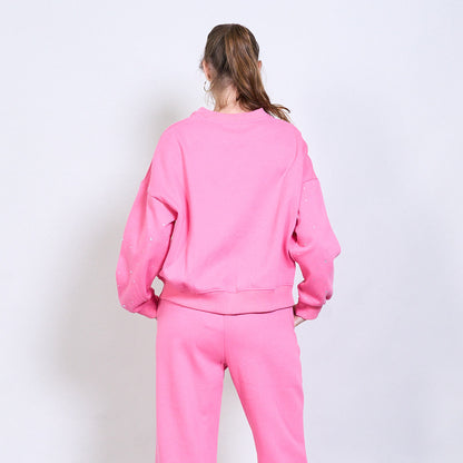 Set aus Sweatshirt und Hose mit Strasssteinen