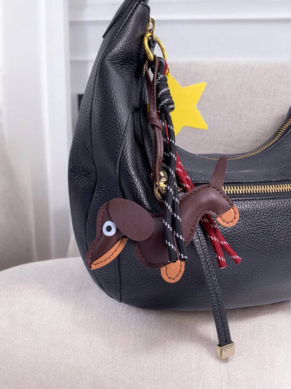 Taschenanhänger und Schlüsselanhänger Hund und Stern PC14